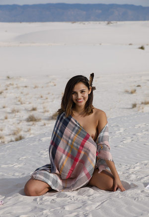 18 year old girl Megan Rain removes her sandals and then clothes to pose naked